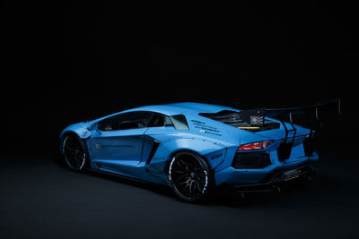 Car on black background
