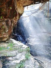 Stream flowing through rocks