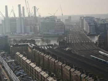 High angle view of buildings against sky in city