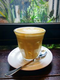 Close-up of coffee served on table