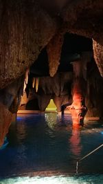 Scenic view of sea seen through cave