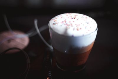 Close-up of frothy drink on table