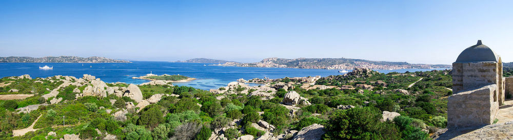 Scenic view of calm sea against clear blue sky