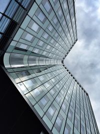 Low angle view of modern building against sky