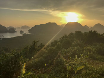 Scenic view of mountains against sky during sunset