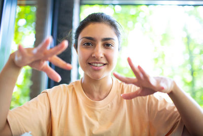 Portrait of smiling young woman