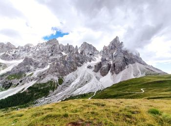 Scenic view of rocky mountains against sky