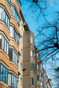 Low angle view of building against blue sky