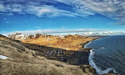 Scenic view of sea against sky during winter