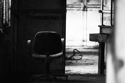 Abandoned chair in city