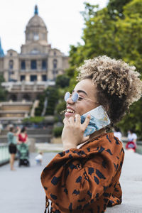 Woman looking at city