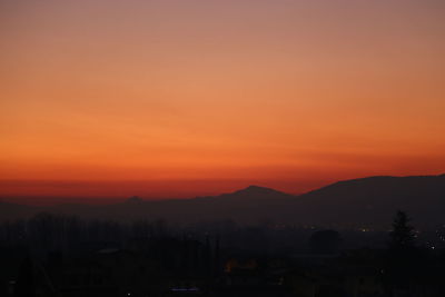 Scenic view of mountains at sunset