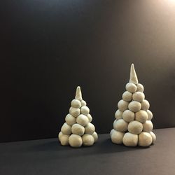 Close-up of stack on table against black background