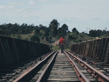 View of footbridge leading towards bridge