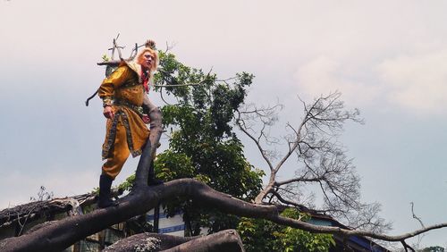 Low angle view of trees against sky