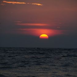 Scenic view of sea at sunset