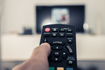 Close-up of hand holding camera