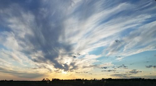 Scenic view of dramatic sky during sunset