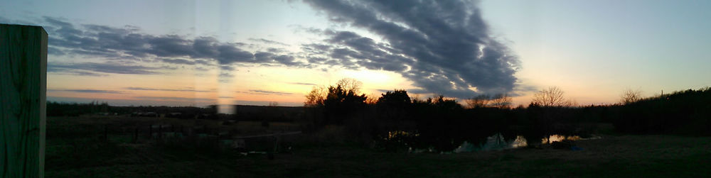 Scenic view of landscape at sunset