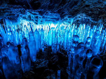 Icicles on rock in cave