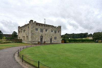 View of historic building against cloudy sky