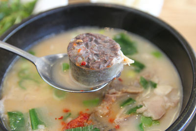 Korean pork rice soup or dwaeji-gukbap with the focus on rice with pork intestine 
