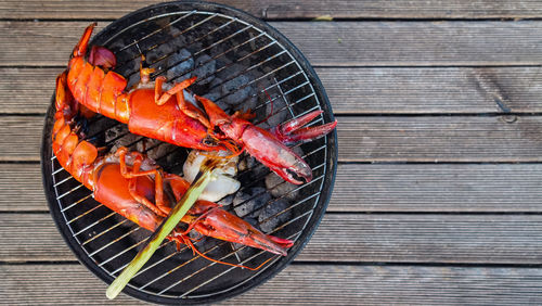 Close-up of meat on barbecue grill