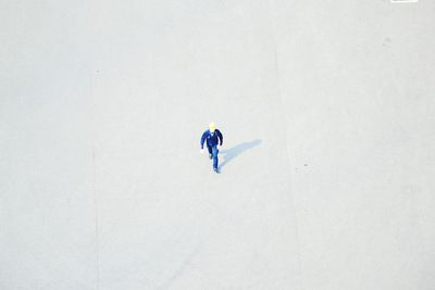 High angle view of people against white background