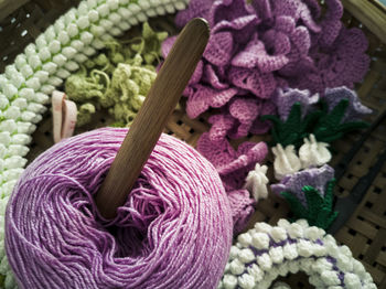 High angle view of multi colored candies in basket