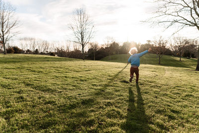 Full length of man on field against sky