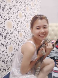 Portrait of happy girl at home