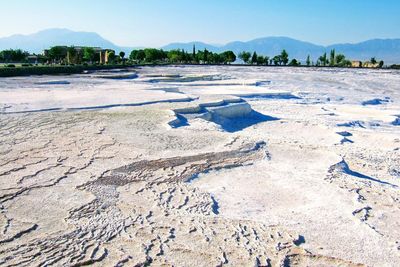 View of salt basin against sky