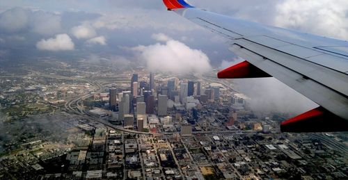 Aerial view of cityscape against sky