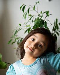 Portrait of an asian toddler, 3 years old. cheeerful, joyful and full of confidence.