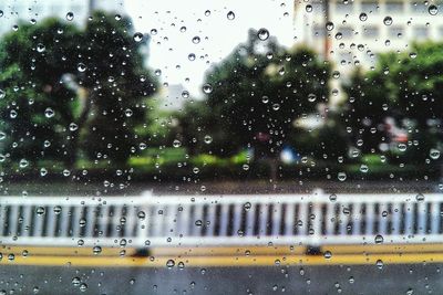 Close-up of wet window in rainy season