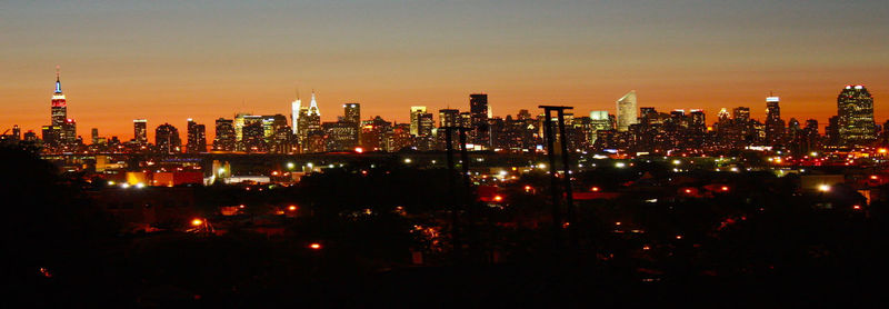 Illuminated cityscape at night