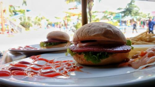 Close-up of burger in plate on table