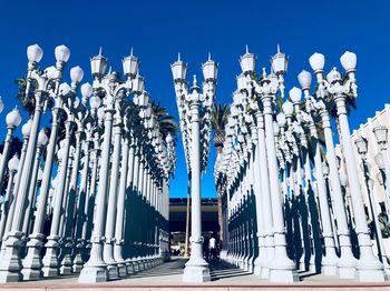 Low angle view of built structure against clear blue sky