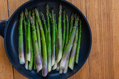 High angle view of vegetables in plate on table