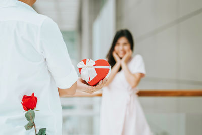 Close-up of woman holding bouquet