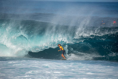 Man surfing in sea