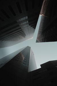 Low angle view of modern buildings against sky