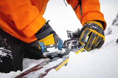 A close-up of the ski bindings as they are set up for backcountry skitouring. sports facility skiing