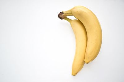 High angle view of bananas against white background