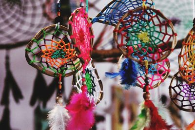 Close-up of colorful dreamcathchers hanging for sale at market