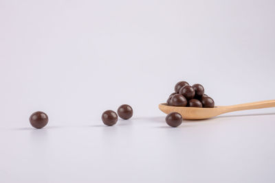 Close-up of pills on white background