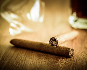 Close-up of tobacco products on table