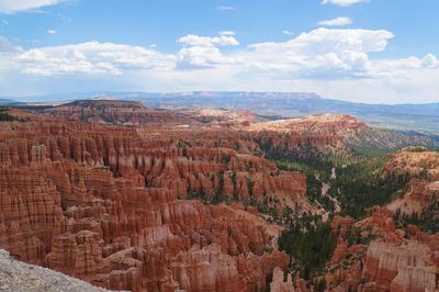 Scenic view of landscape against cloudy sky, bryce canyon