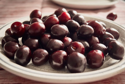 High angle view of fruits in plate on table