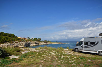 Scenic view of beach against sky